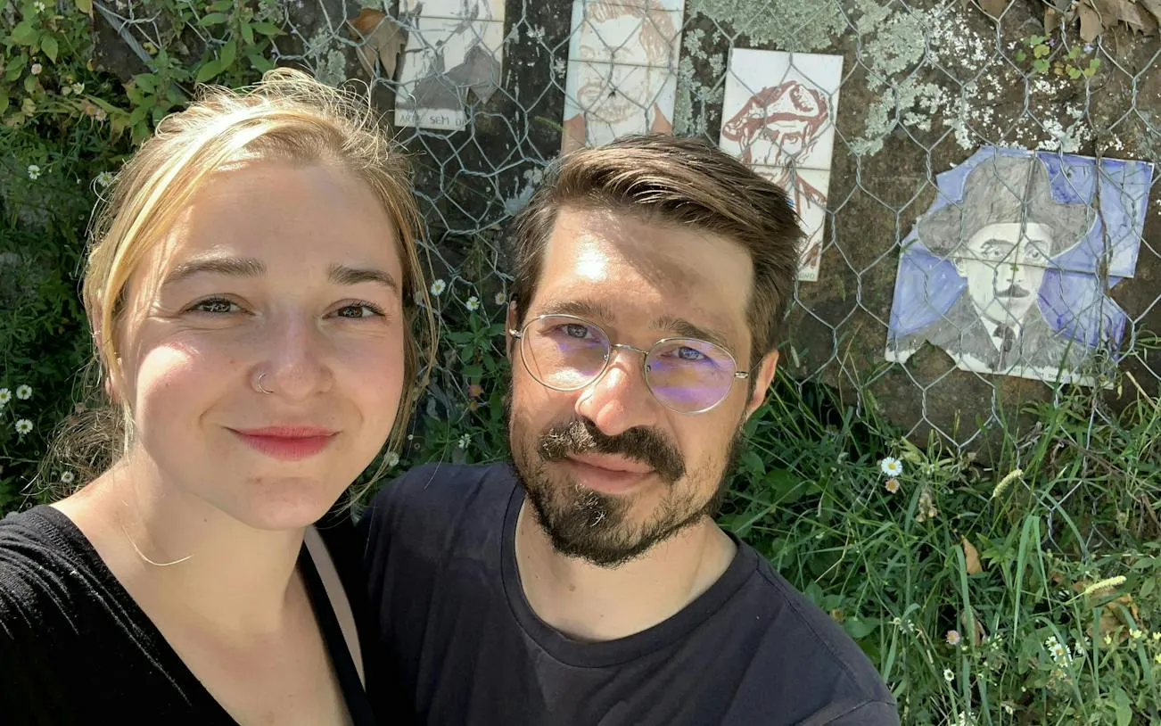 Couple exploring Porto with local art on a self-guided city game tour.