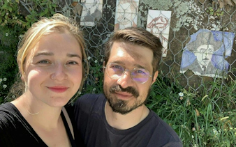 Couple exploring Porto with local art on a self-guided city game tour.