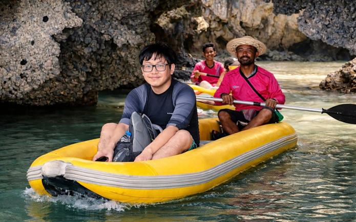 Canoeing through limestone caves on James Bond Island tour from Phuket.