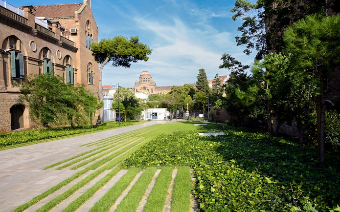 Recinto Modernista de Sant Pau gardens with historic architecture in Barcelona.