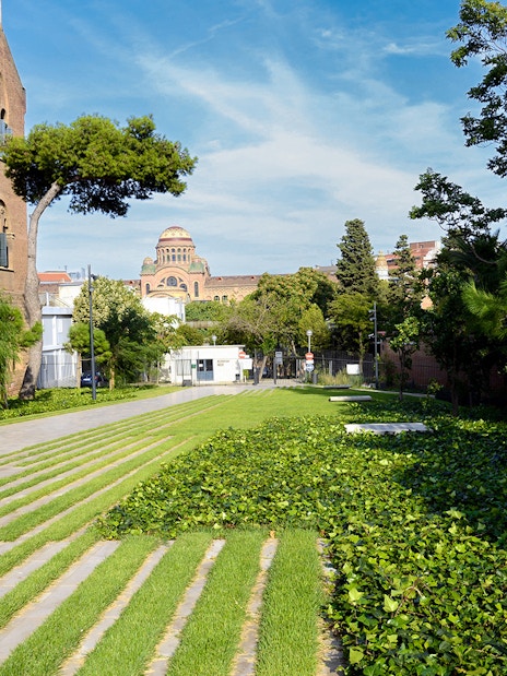 Recinto Modernista de Sant Pau gardens with historic architecture in Barcelona.