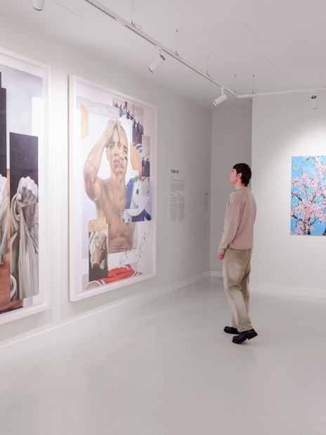 Visitor viewing contemporary art at Moco Museum Barcelona exhibition.