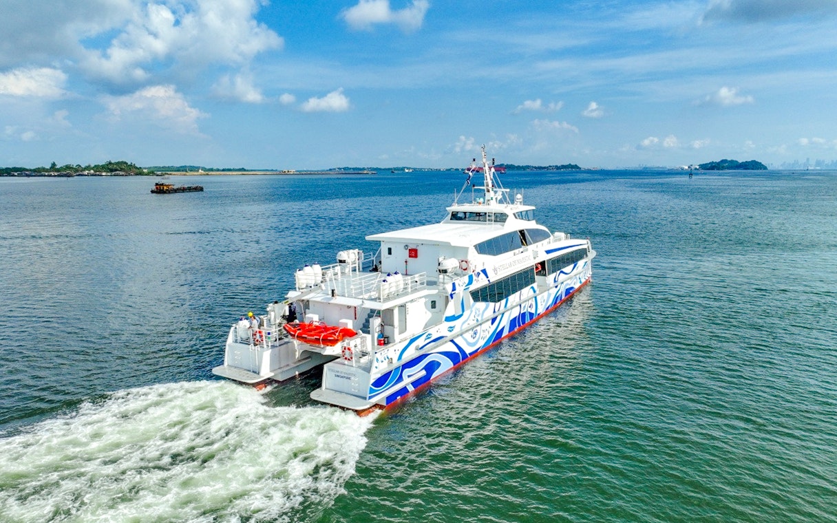Ferry traveling from Singapore to Bintan across the open sea.