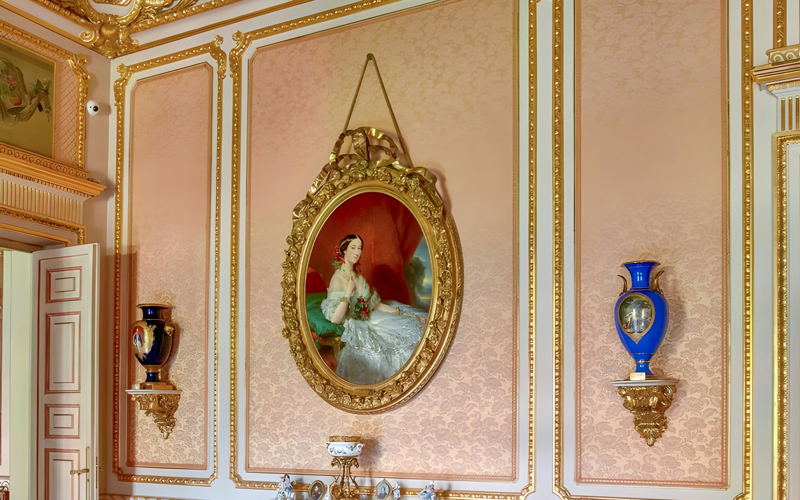 Golden-framed painting in Liria Palace, Madrid, showcasing historical art.