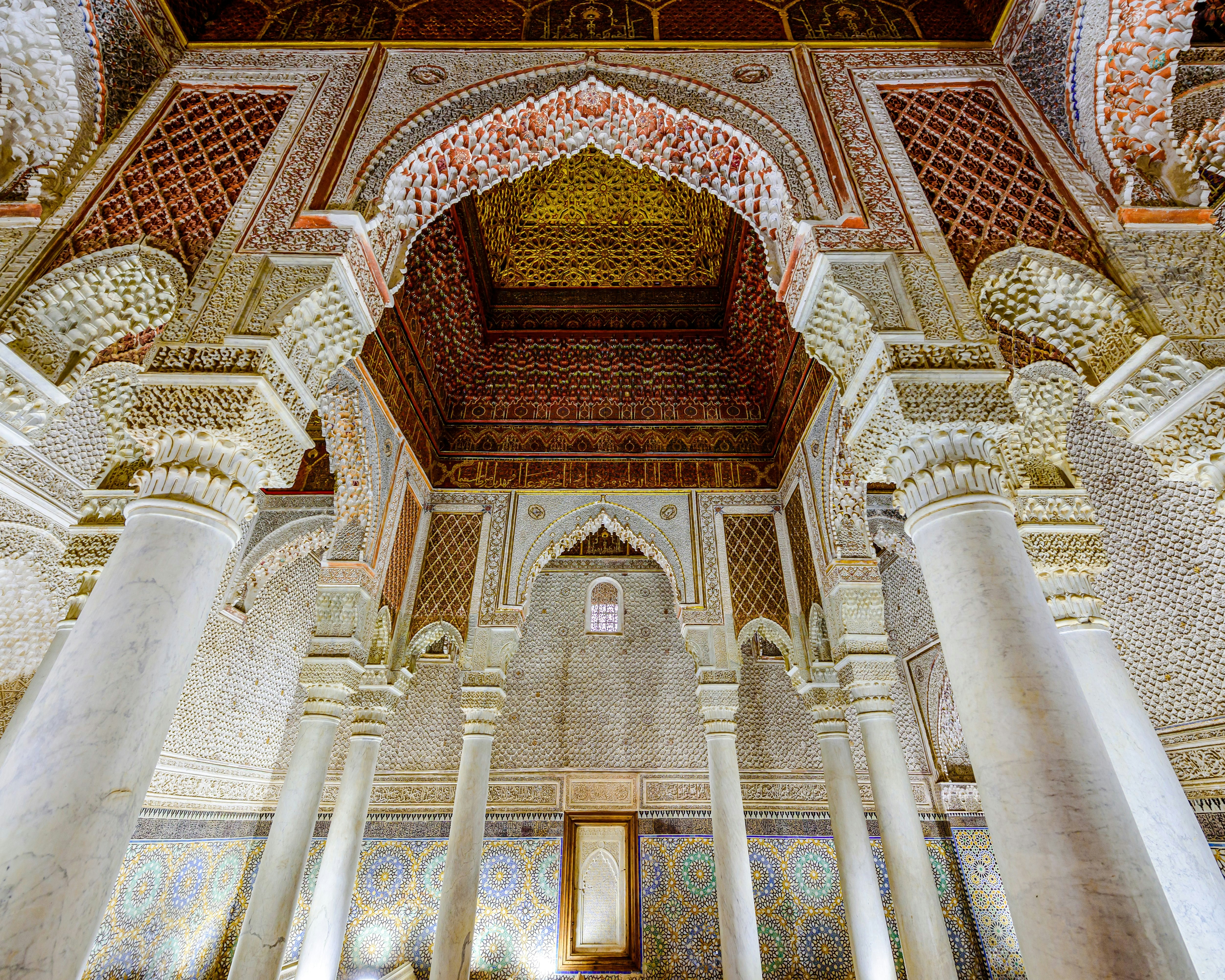 Saadian Tombs interior with ornate arches and columns in Marrakech, Morocco.