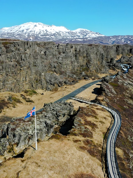 Aerial view of Thingvellir National Park with Icelandic flag, part of the Golden Circle near Reykjavik.