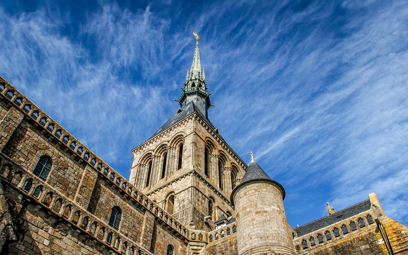 Temples and intricate architecture in Mont Saint Michel city.