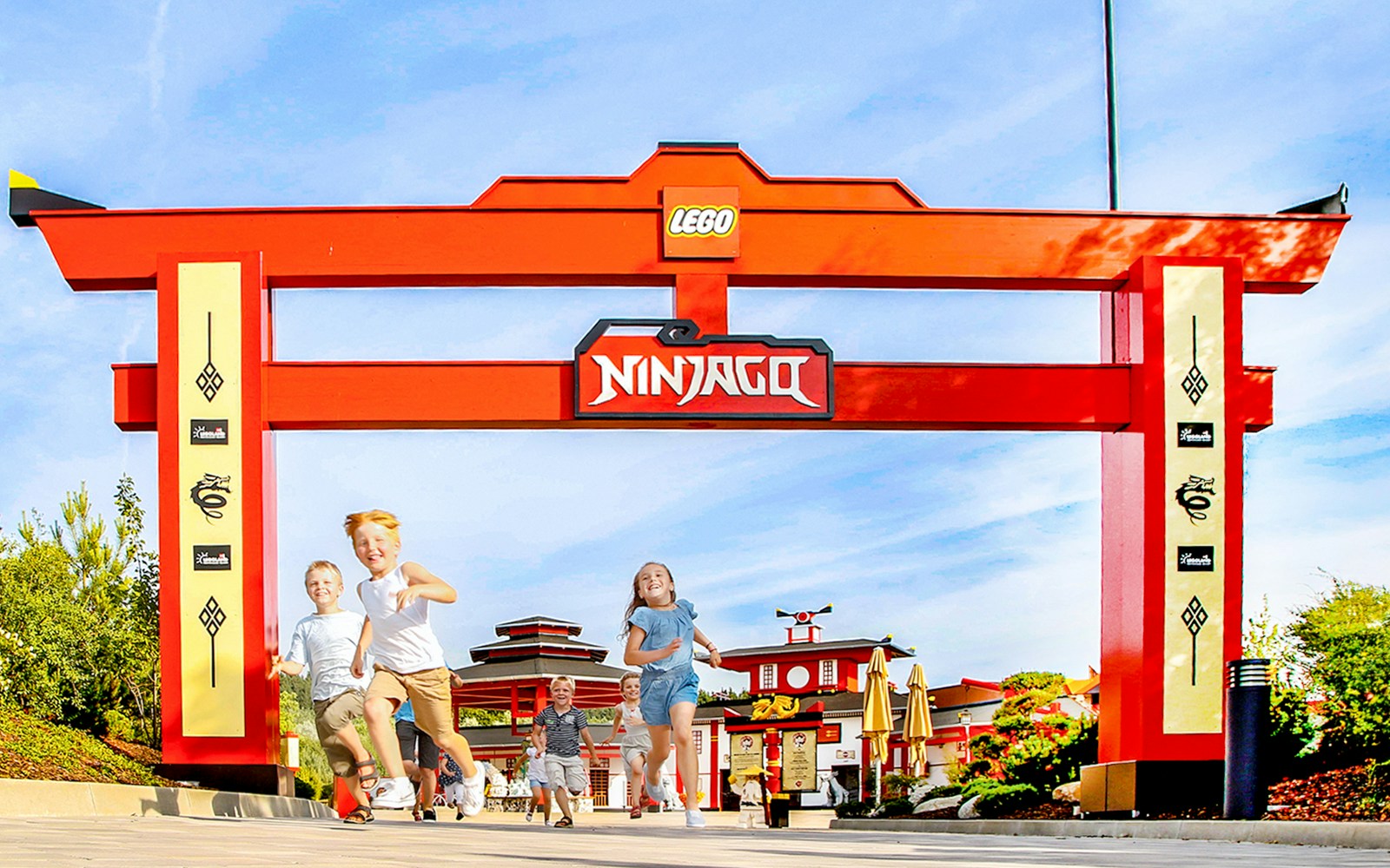 Children running through Ninjago Portal at Legoland Germany.