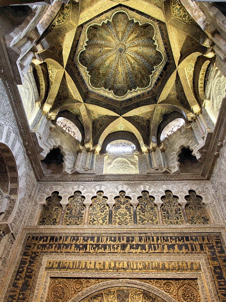 Cordoba Mosque-Cathedral Mihrab ceiling with intricate arches and detailed carvings.
