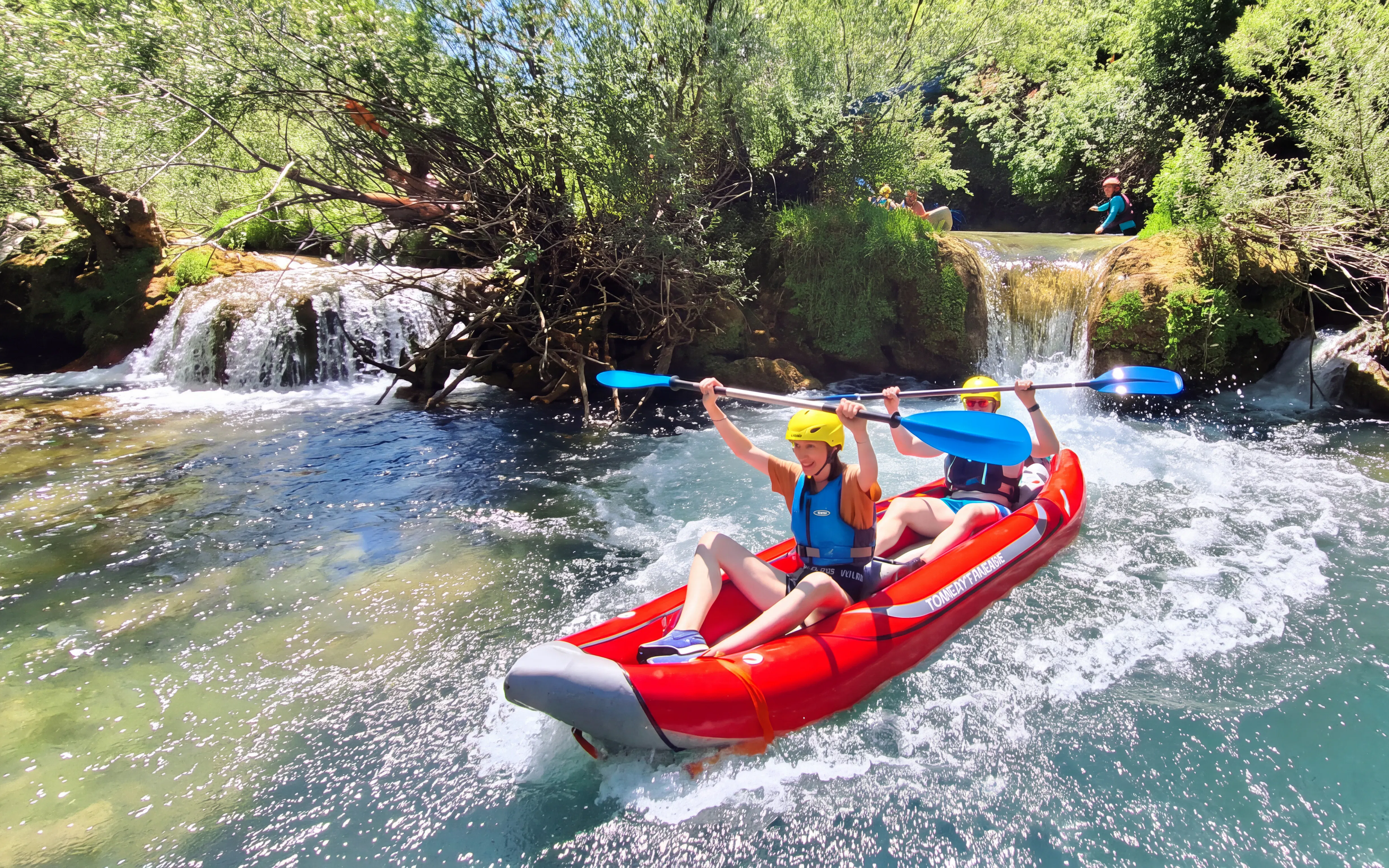 Tourists kayaking through Mrežnica Canyon Waterfalls in Split.