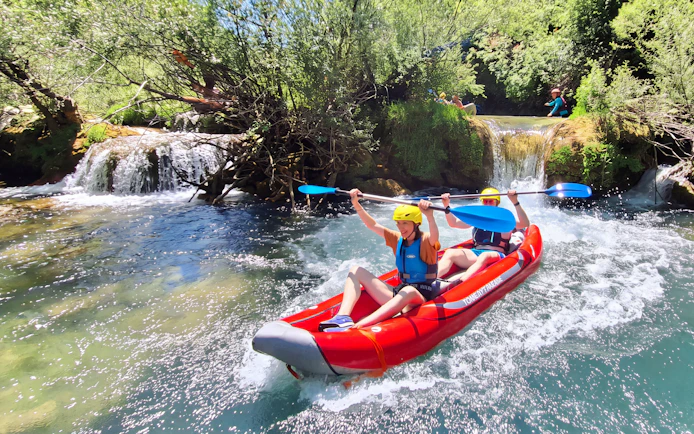Tourists kayaking through Mrežnica Canyon Waterfalls in Split.