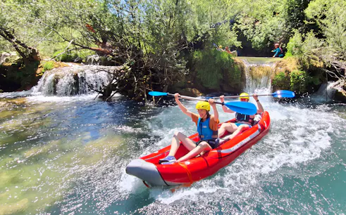 Tourists kayaking through Mrežnica Canyon Waterfalls in Split.