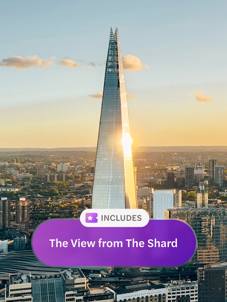 Aerial view of the Shard tower in central London at sunset.