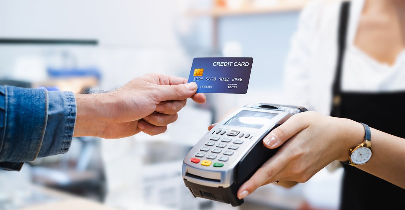 man using card for pay