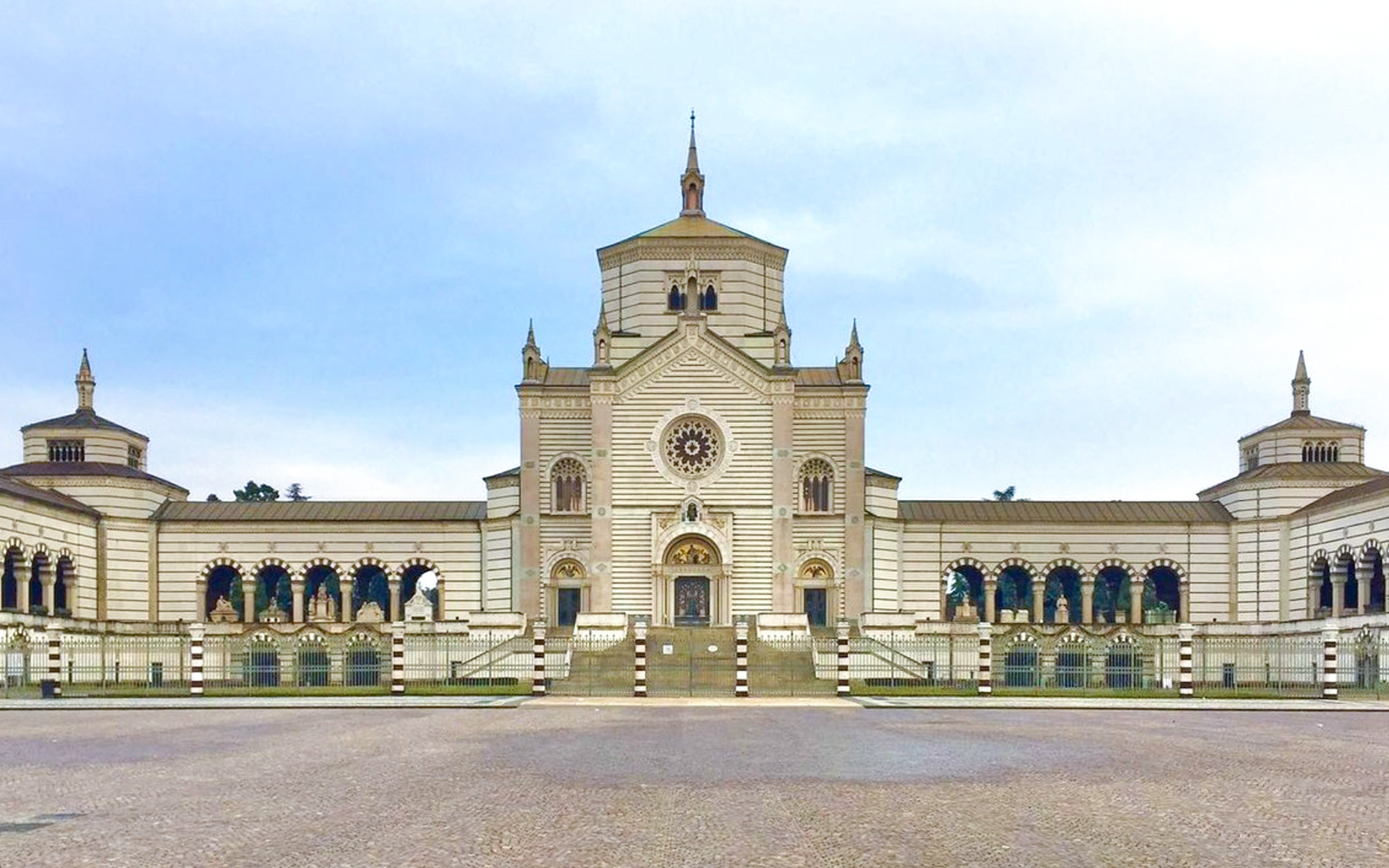 Milan's Monumental Cemetery facade, included in Official Milano Pass.