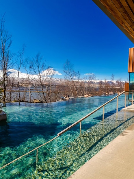 Entrance to Forest Lagoon geothermal spa with trees in Vaðlaskógur forest, near Akureyri, North Iceland.