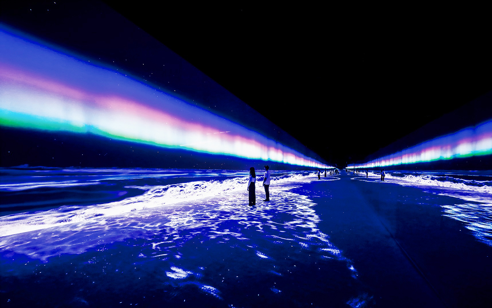 Immersive digital art installation at ARTE Museum, New York, featuring vibrant light projections.