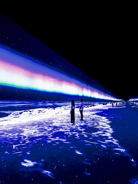 Immersive digital art installation at ARTE Museum, New York, featuring vibrant light projections.