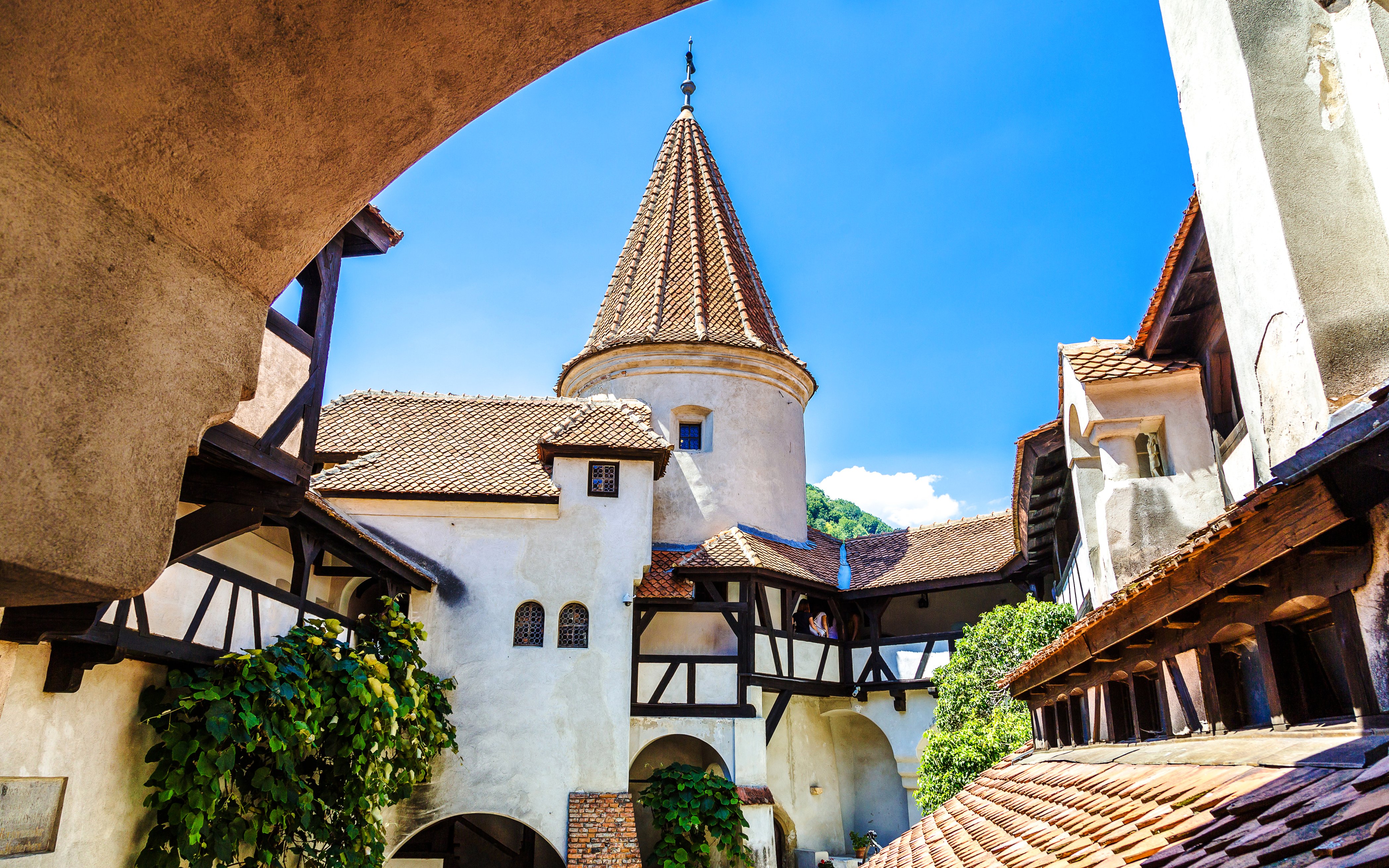 Bran Castle courtyard with medieval architecture in Transylvania.