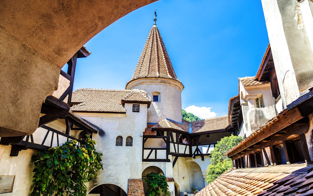 Bran Castle courtyard with medieval architecture in Transylvania.