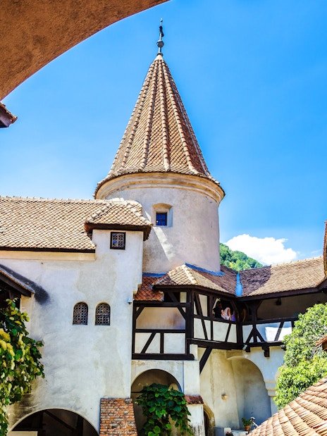 Bran Castle courtyard with medieval architecture in Transylvania.