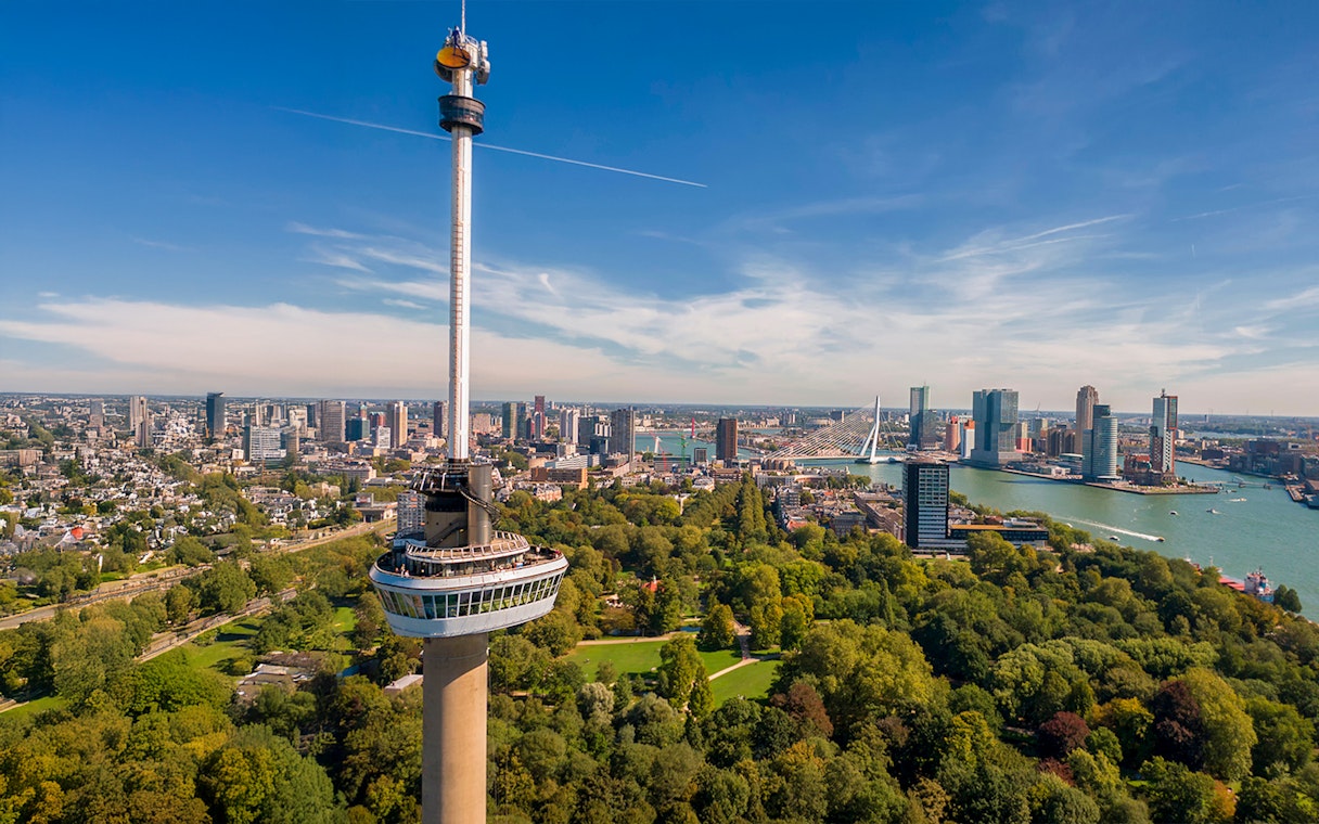 Aerial view of Rotterdam featuring the Euromast tower and Erasmus Bridge.