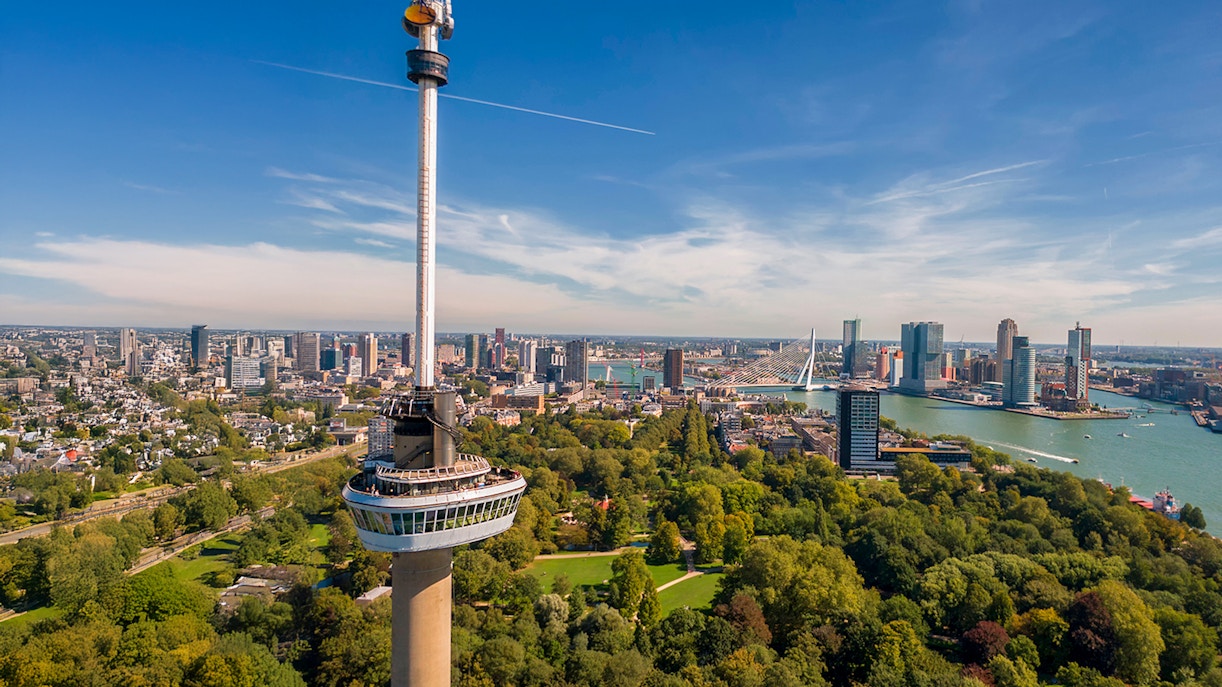 Aerial view of Rotterdam featuring the Euromast tower and Erasmus Bridge.