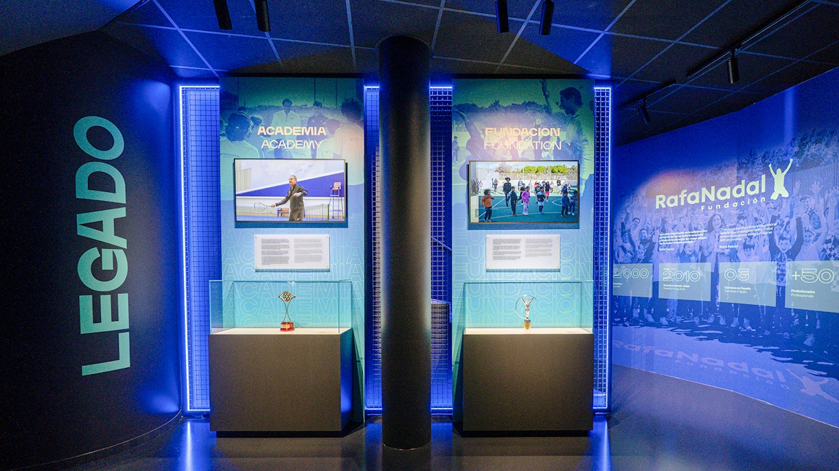 Interiors of the Rafa Nadal Museum showcasing tennis academy and foundation exhibits.