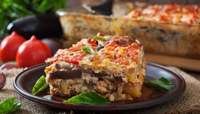 Moussaka served on a plate with fresh basil, Athens in December.