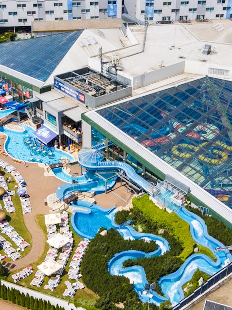 Aerial view of Aquapalace Water World with pools and water slides in Prague.