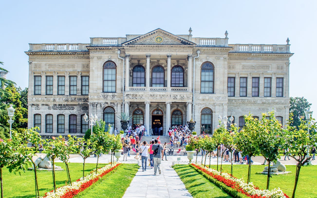Dolmabahçe Palace entrance with tourists, Istanbul Bosphorus Cruise.