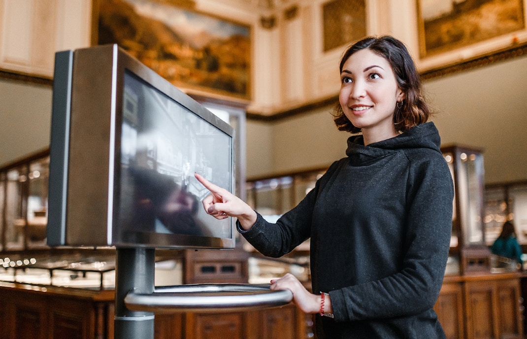 Interactive engagement as a visitor explores Video Stories at the Uffizi Gallery exhibitions, enhancing the experience with digital narratives