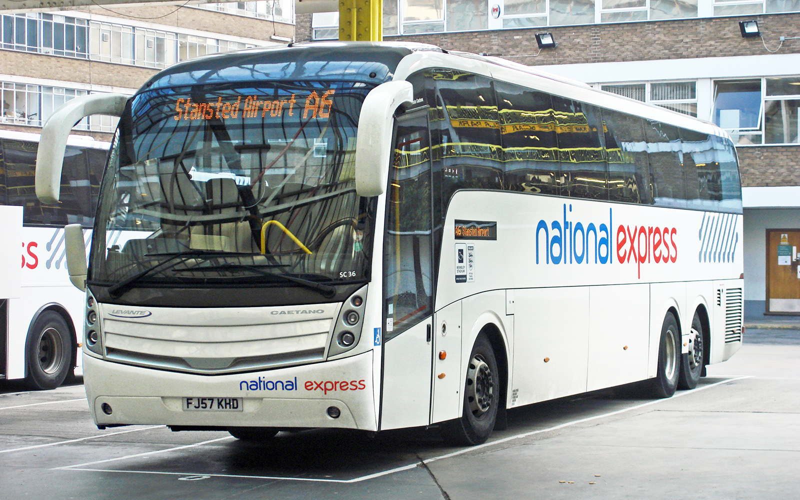 National Express coach at Luton Airport terminal.