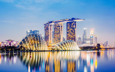 Panoramic view of Singapore cityscape from Marina Bay Sands Skypark Observation Deck.
