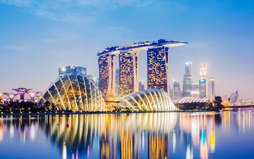 Panoramic view of Singapore cityscape from Marina Bay Sands Skypark Observation Deck.