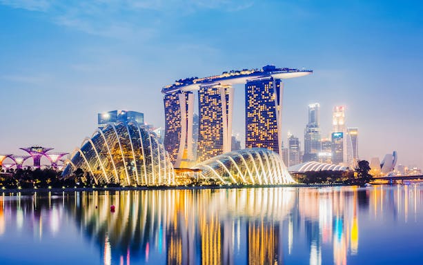 Panoramic view of Singapore cityscape from Marina Bay Sands Skypark Observation Deck.
