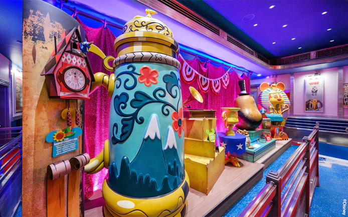 Colorful cartoon-themed decor at Mickey's Toontown attractions, Disneyland Park, California.