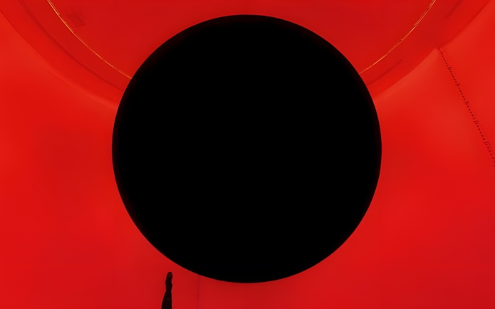 Immersive red and black art installation at TeamLab Phenomena Abu Dhabi.