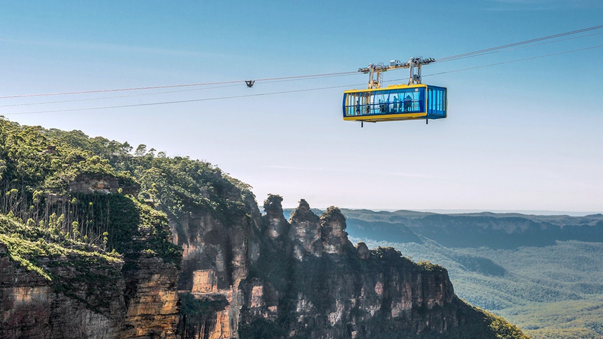 Scenic Skyway cable car crossing above Blue Mountains forest at Scenic World, Australia.