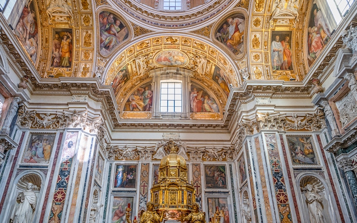 Santa Maria Maggiore Papal Altar with ornate frescoes and gold detailing.