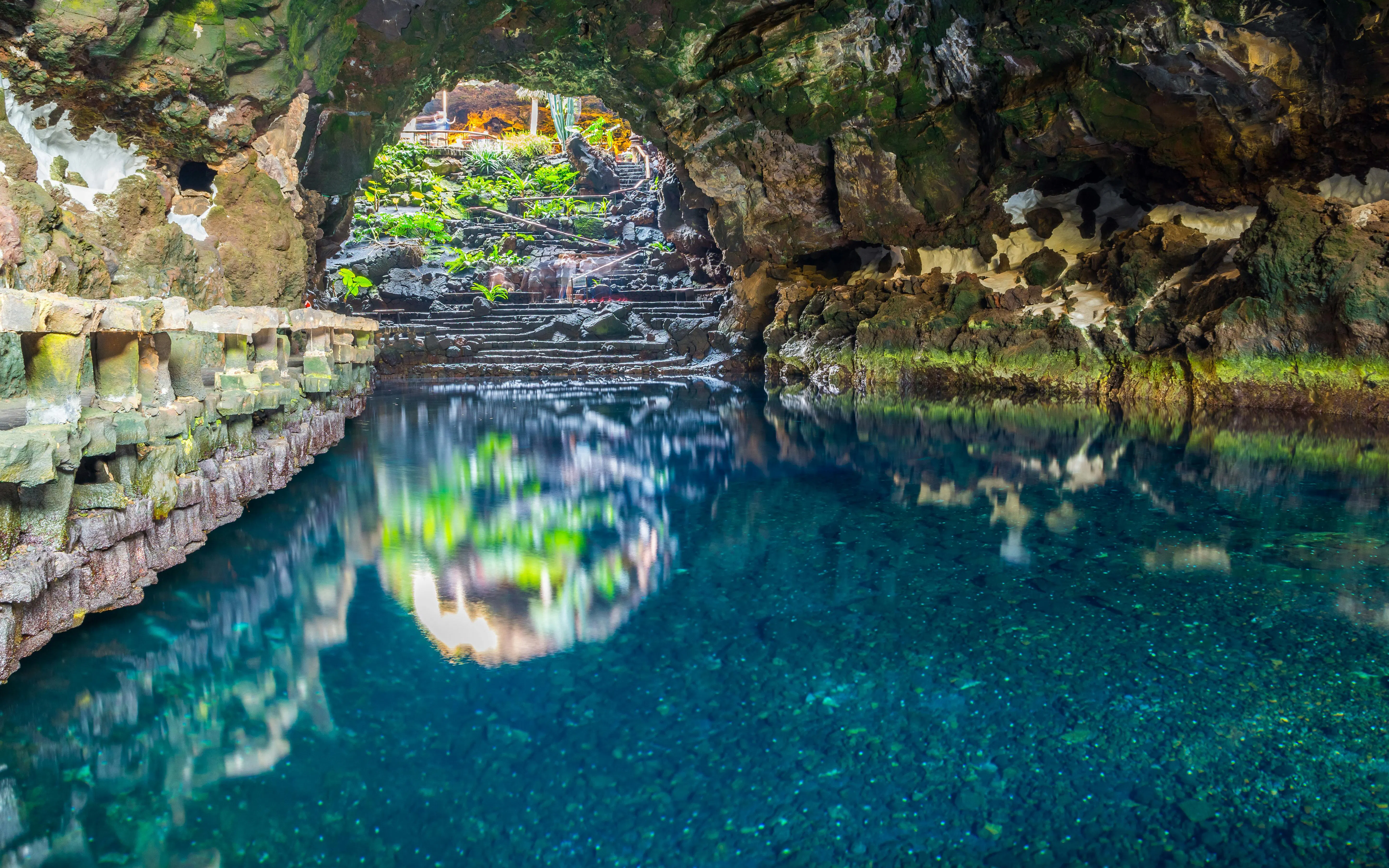 Cave pool and rock formations in Jameos del Agua, Lanzarote, Canary Islands, Spain.
