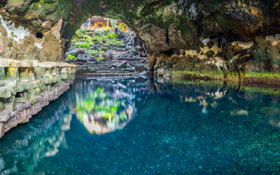 Cave pool and rock formations in Jameos del Agua, Lanzarote, Canary Islands, Spain.