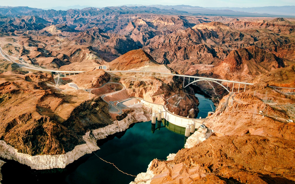 Aerial view of Hoover Dam and surrounding desert landscape, Nevada.