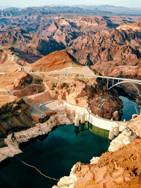Aerial view of Hoover Dam and surrounding desert landscape, Nevada.