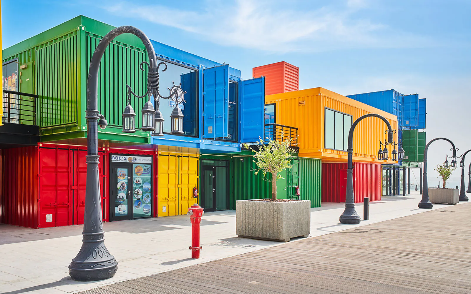 Colorful shipping container shops at The Pearl Island, Qatar.