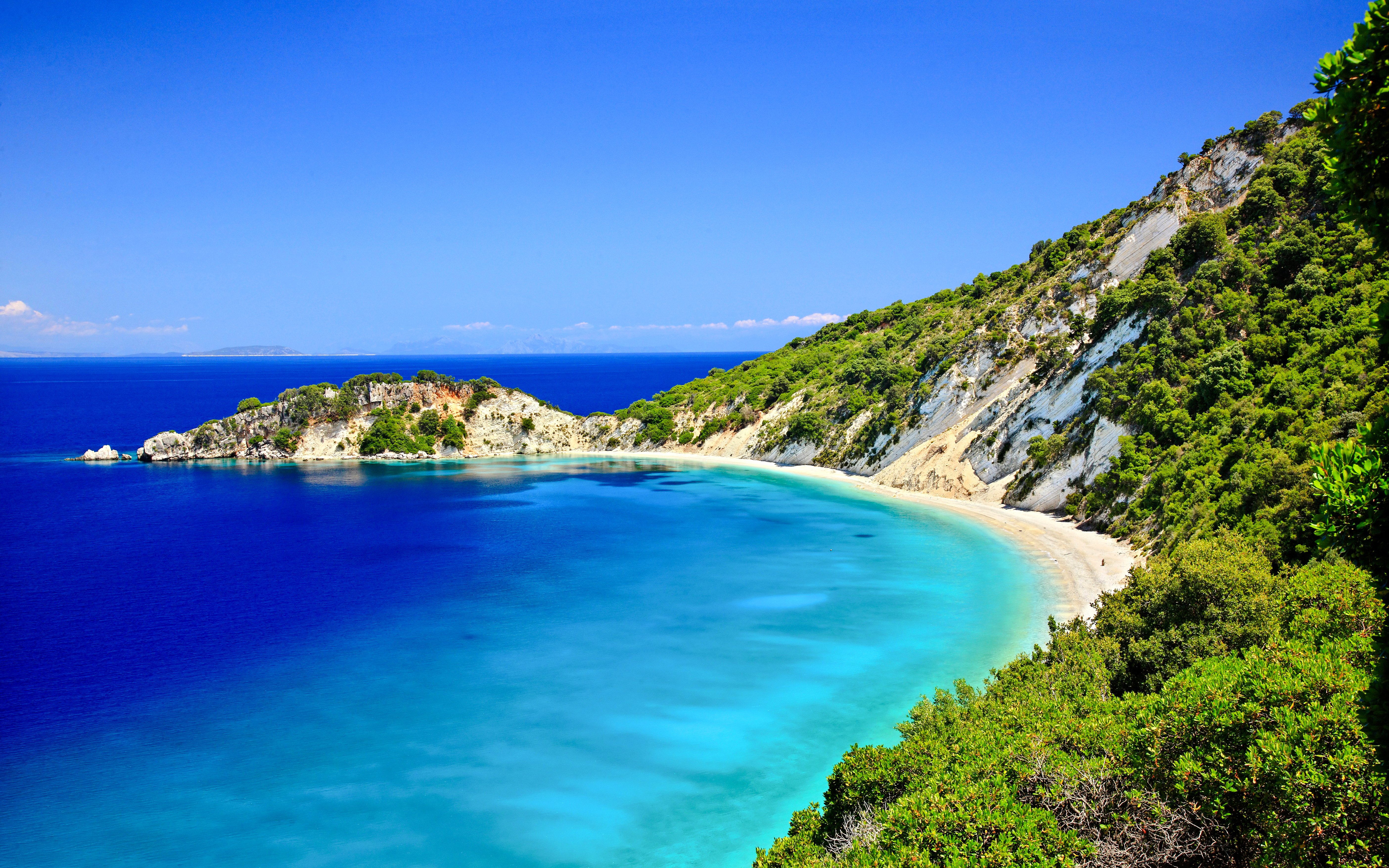 Gidaki Beach with turquoise waters and lush cliffs, Ithaca Island, Greece.