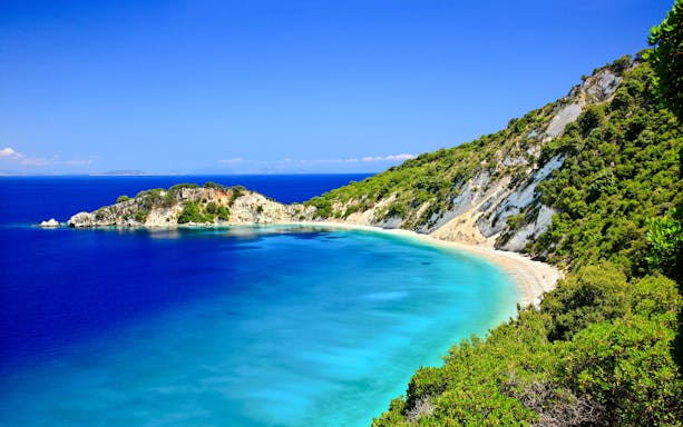 Gidaki Beach with turquoise waters and lush cliffs, Ithaca Island, Greece.