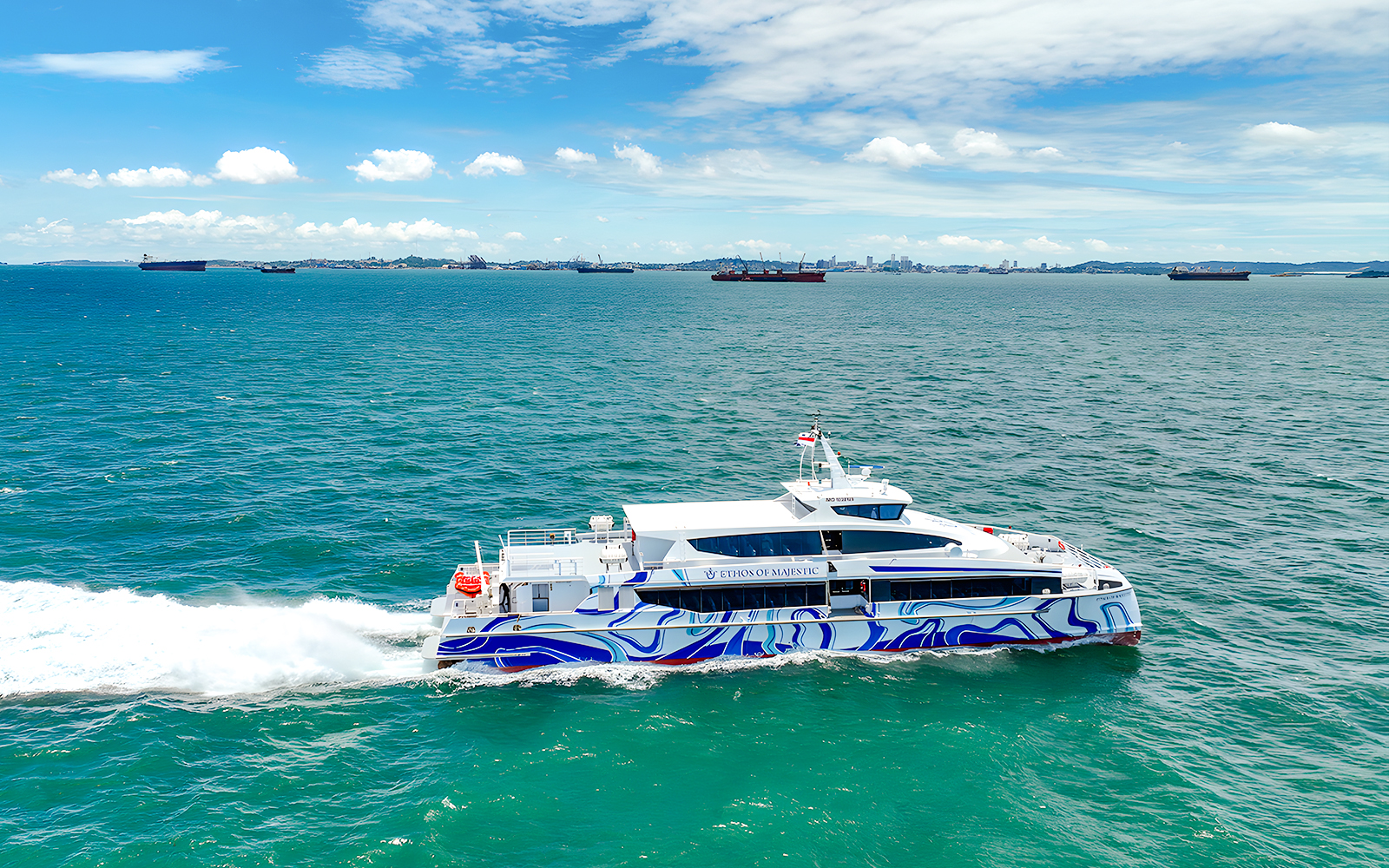 Ferry traveling from Singapore to Batam across the blue sea.