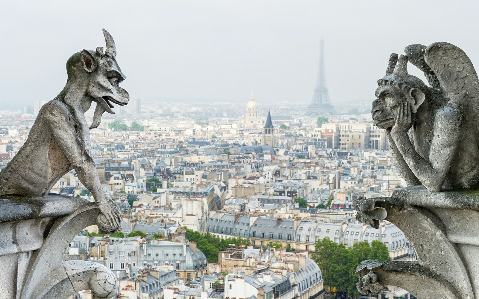 Notre Dame de Paris stone gargoyle and chimera statues.