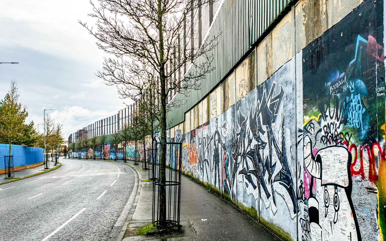 Solidarity Wall in Belfast featuring colorful murals promoting peace and unity.
